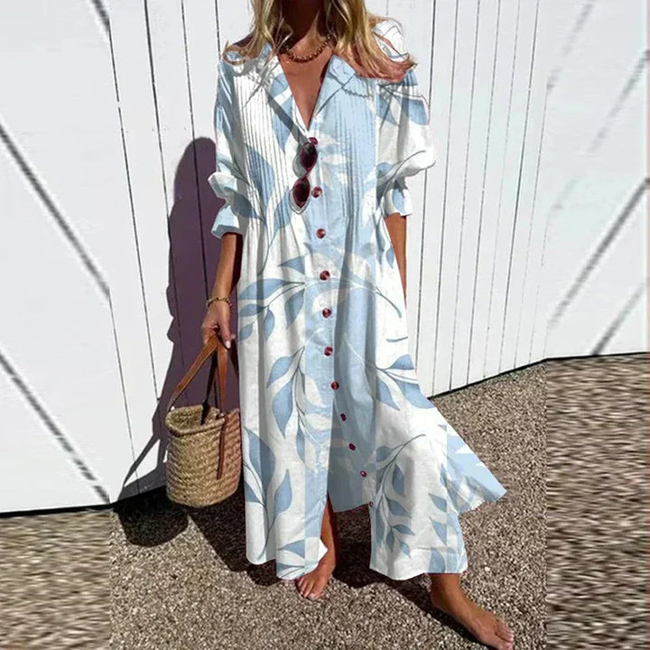 White and blue leaf print pleated dress with a collar, front view