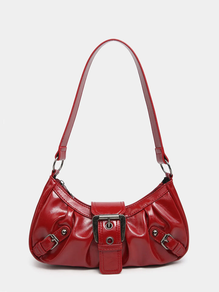 Front view of the Nola Retro Y2K Shoulder Bag, a shiny red faux leather handbag with buckle details