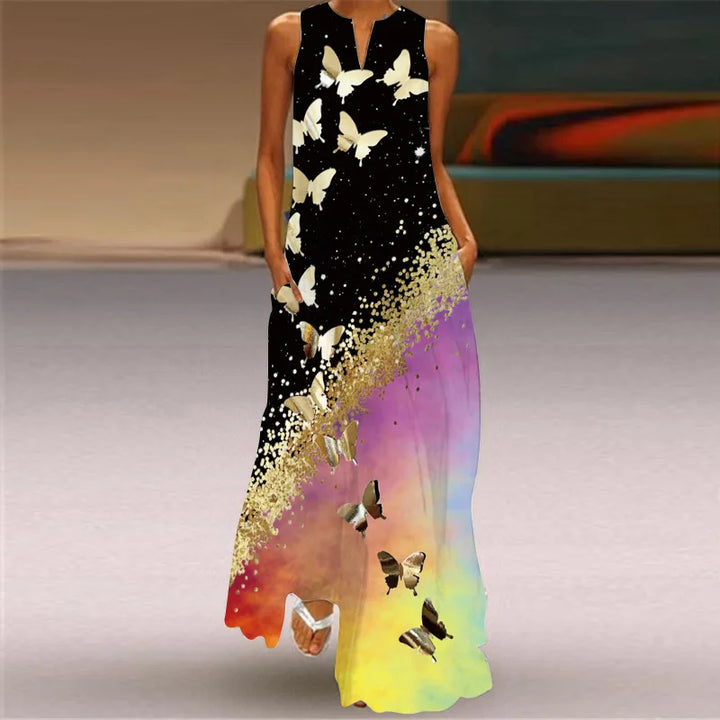 Front view worn by model, Butterfly Bloom A-Line Dress with black top, gold glitter, and rainbow gradient skirt