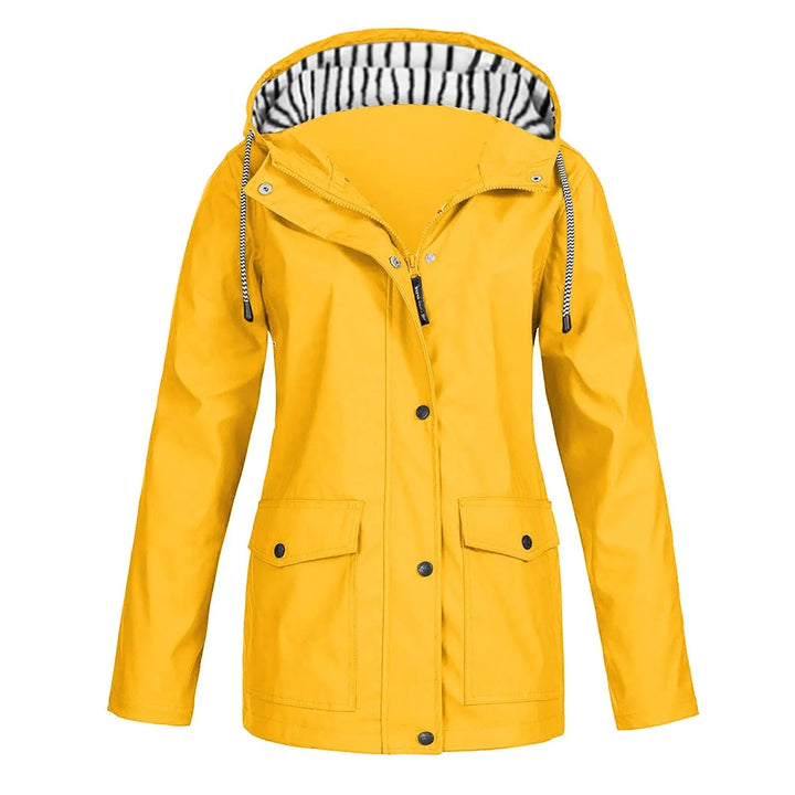 Front view of a yellow Isla long waterproof hooded raincoat jacket with a zip and button closure
