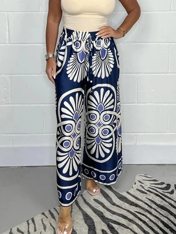 Retro Floral Satin Lounge Pants, front view worn by model, with a drawstring waist and wide leg, standing with, closer view