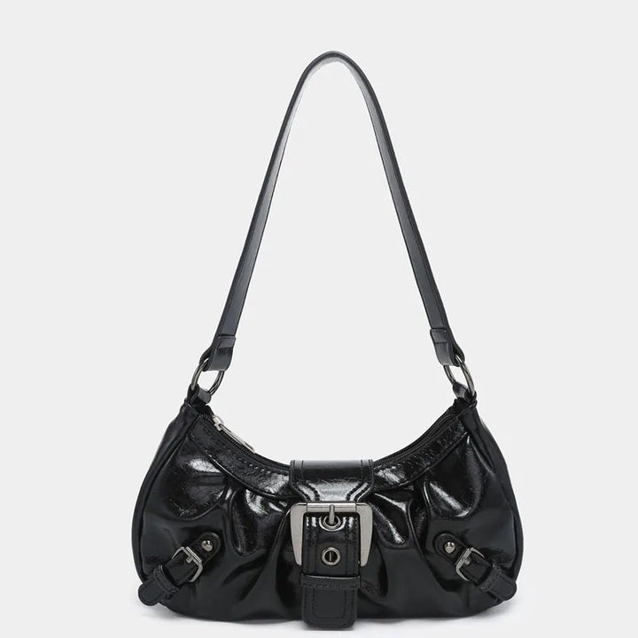 Front view of the Nola Retro Y2K Shoulder Bag, a shiny black faux leather handbag with buckle details