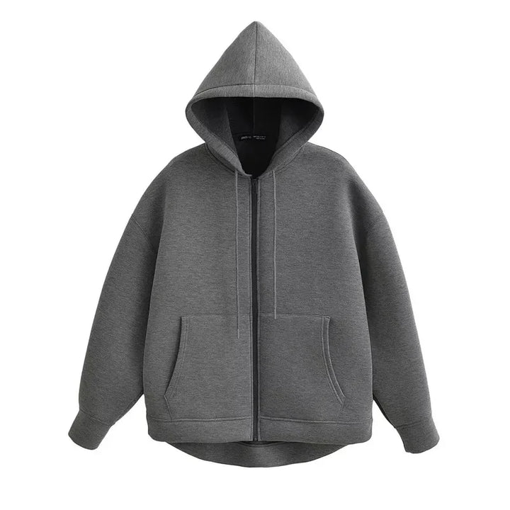 Front view of a dark grey oversized full zip hoodie with hood up and pockets visible