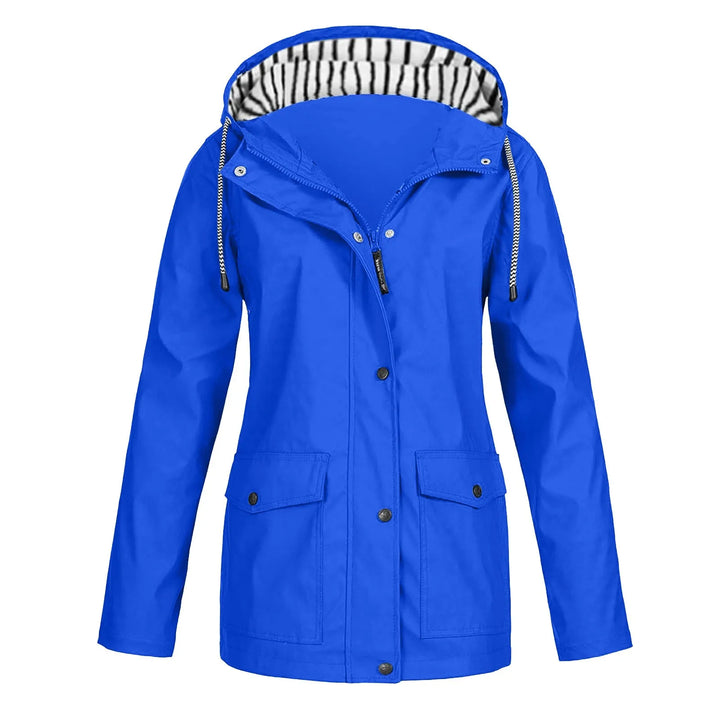 Front view of a blue Isla long waterproof hooded raincoat jacket with black and white striped hood lining
