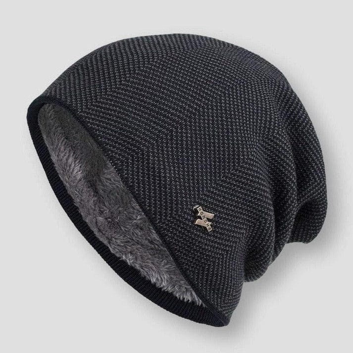 Front view of the Classic Knitted Wool Beanie with a chevron pattern and a small metallic logo badge