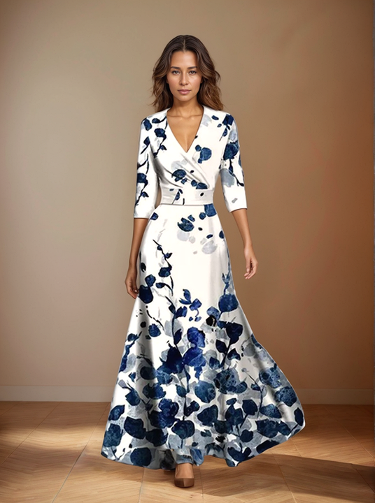 Front view, model wearing a white floral print wrap dress with a v neck and three quarter sleeves