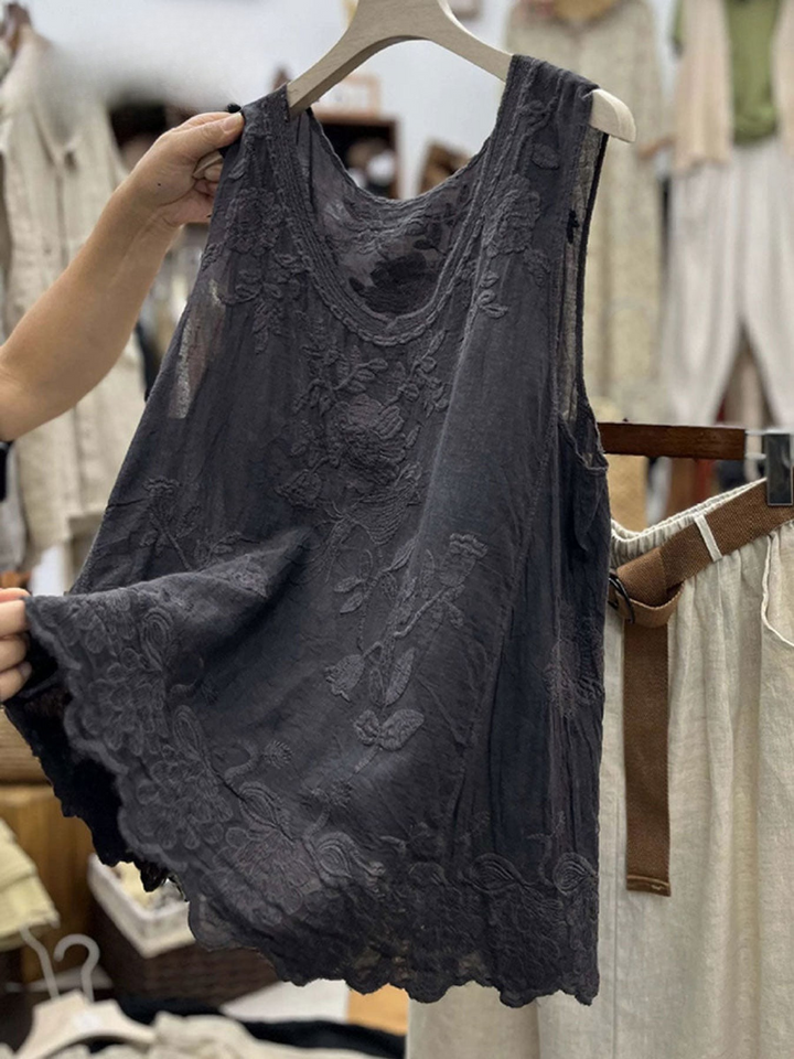Close up of a dark grey vintage lace sleeveless cotton linen vest top with embroidered flowers and a scalloped hem