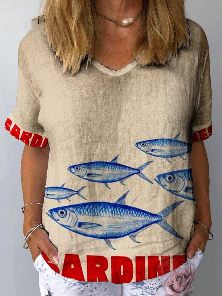 Beige vintage art print cotton linen shirt with a blue fish design