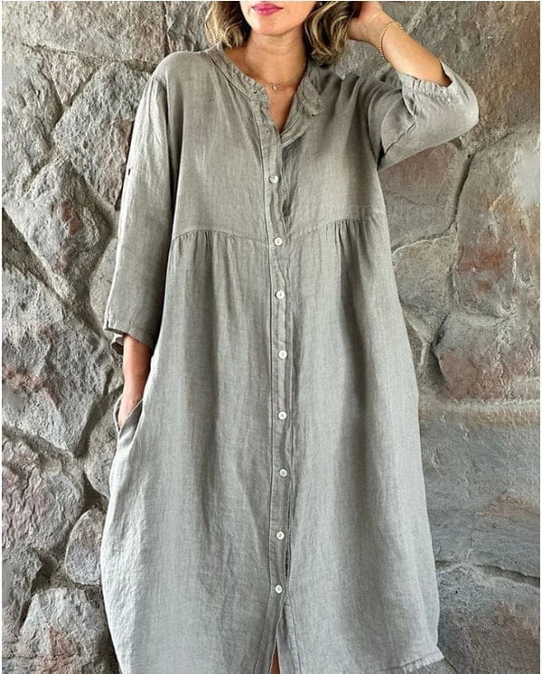 Sage green loose shirt midi dress with white buttons, front view