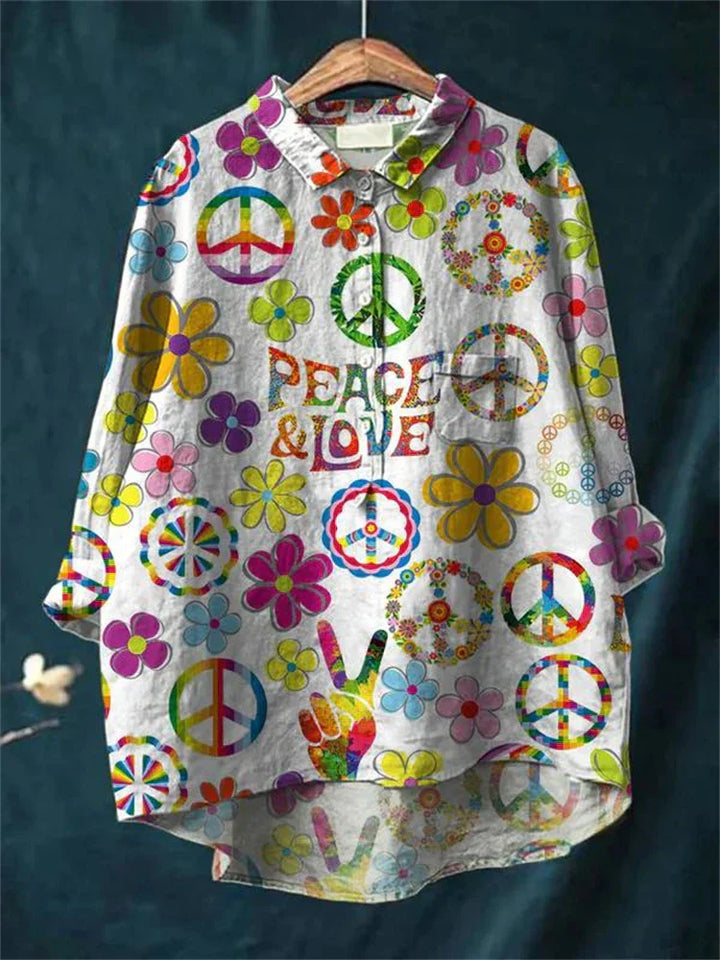 Peace Hippie-Inspired Art Shirt front view with "PEACE & LOVE" text, colourful flowers and peace signs