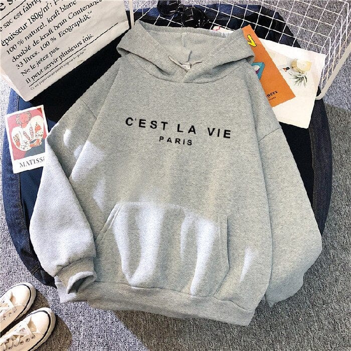 Front view of a grey oversized hoodie with "C&
