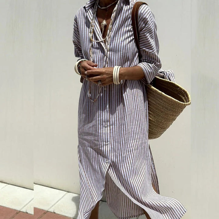 White and brown striped shirt dress worn with a straw bag
