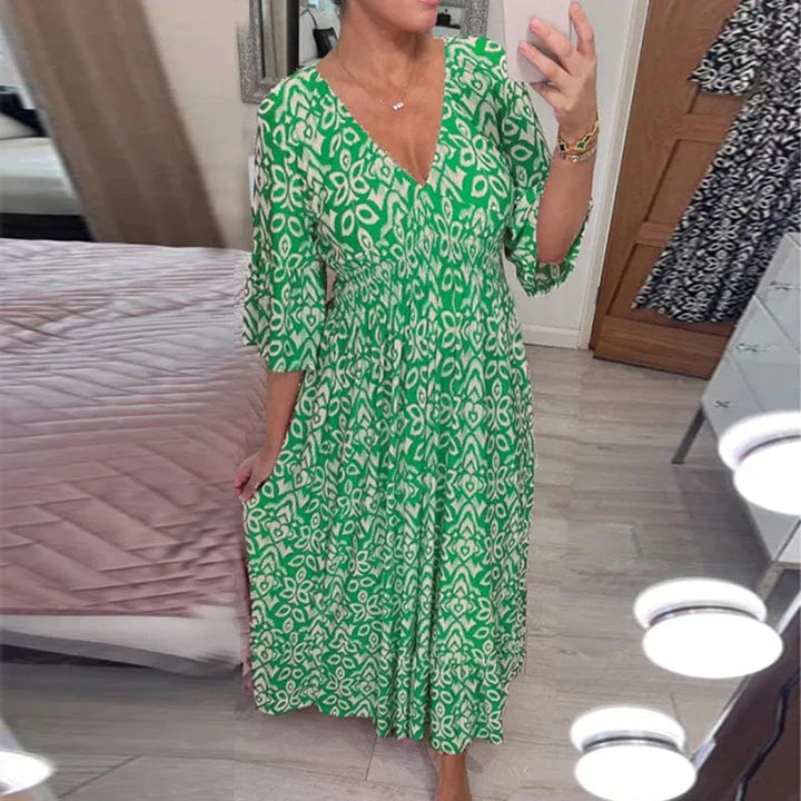 Printed Dress worn by model, close up view, green and white pattern, V-neck, wide sleeves, summer style