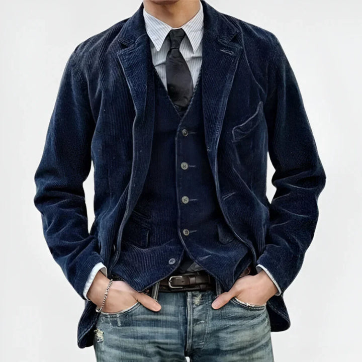 Jasper Retro Jacket, close up front view, dark blue corduroy jacket with matching vest, and jeans