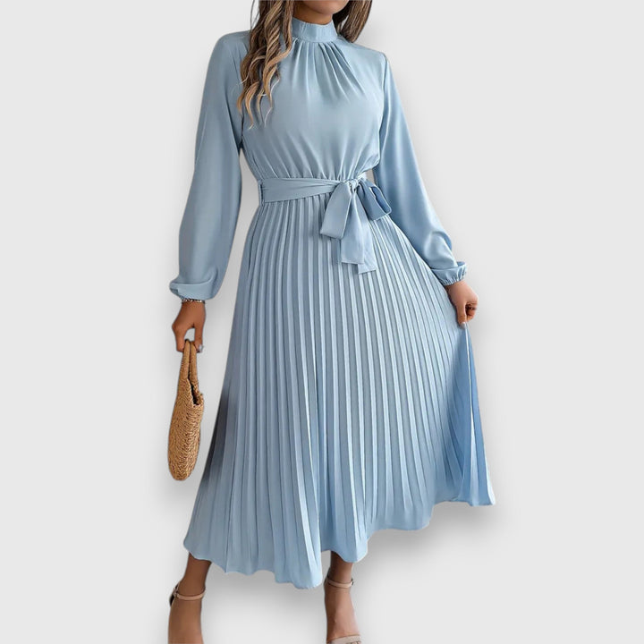 Malia Pleated Midi Dress, worn by model, front view, light blue with long sleeves and a tie waist