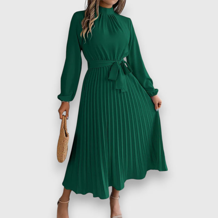 Malia Pleated Midi Dress, worn by model, front view, in forest green with a high neck and tie waist