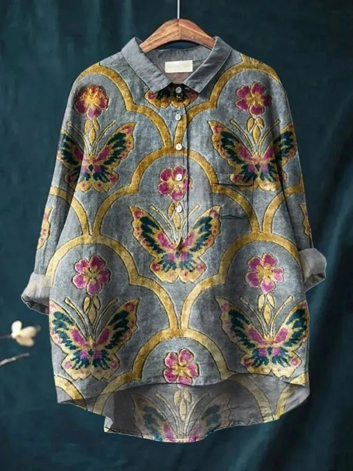 Peace Hippie-Inspired Art Shirt front view with a grey base, golden arches, butterflies and flowers, on a hanger