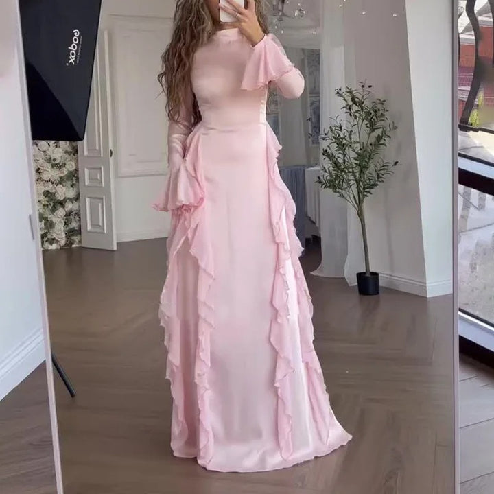Front view of a model wearing the pink elegant patchwork maxi dress with bell sleeves and cascading ruffles