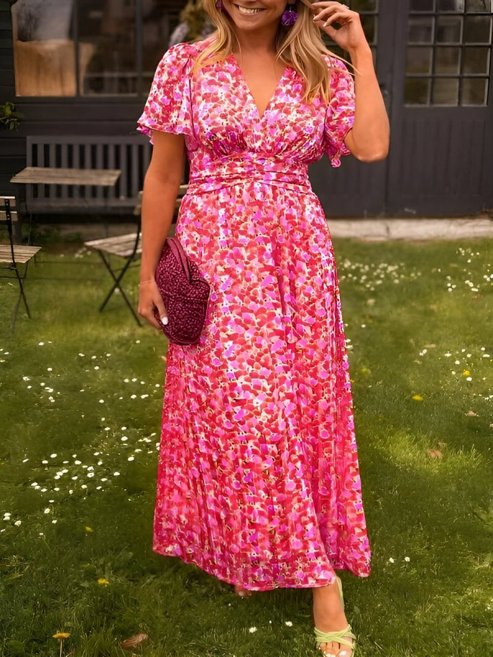 Front view of a model in a garden wearing a women&