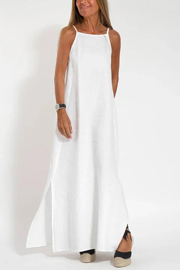 Front view, Ilaria elegant dress in white, worn by model with a watch and black espadrille sandals