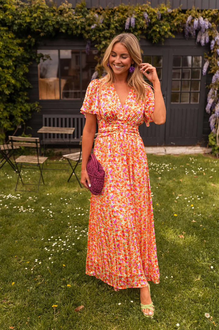 Front view of a smiling model wearing a women&