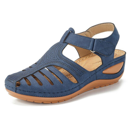 Side view of a blue orthopedic summer sandal with cutouts, perforated detail, and a velcro strap