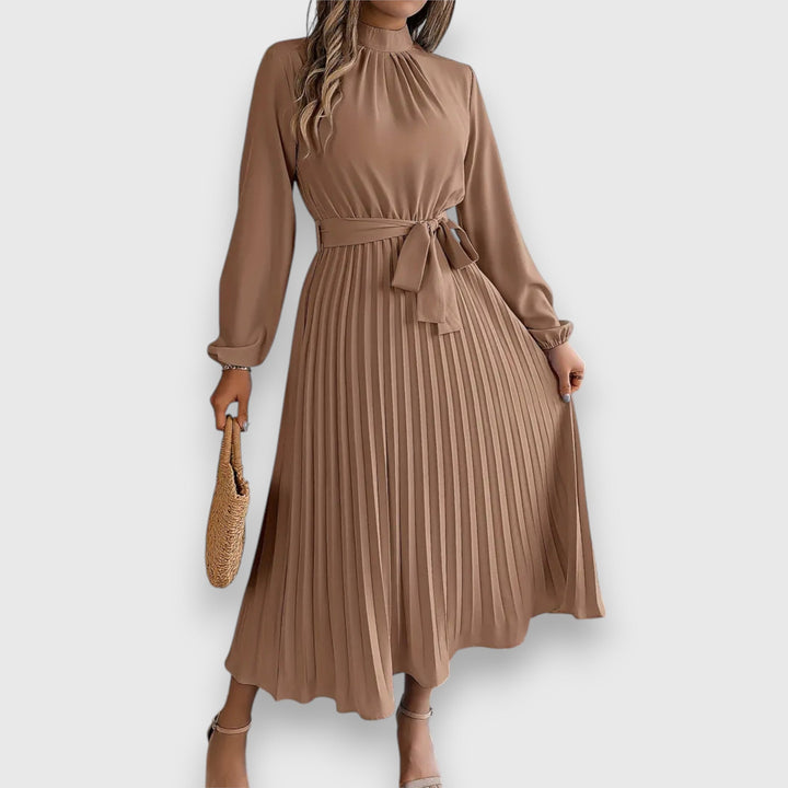 Malia Pleated Midi Dress, worn by model, front view, in camel with a high neck and tie waist