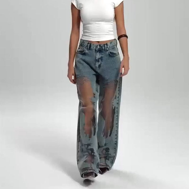 Light blue see through patchwork wide leg jeans with a white top