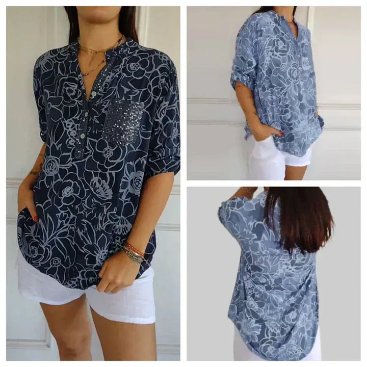 Navy blue floral V neck blouse shown in front, side and back views