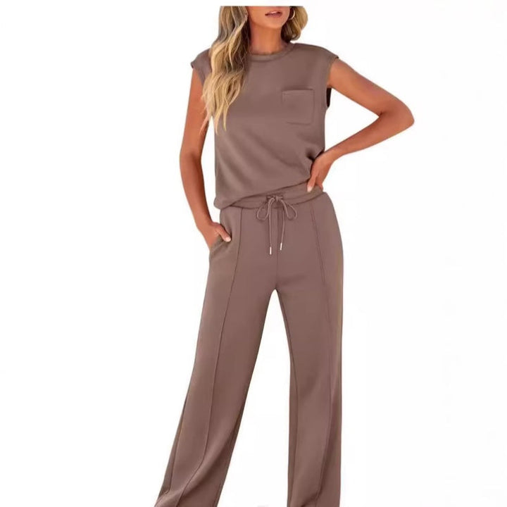 Front view worn by model, brown sleeveless top and drawstring pants set with chest and side pockets
