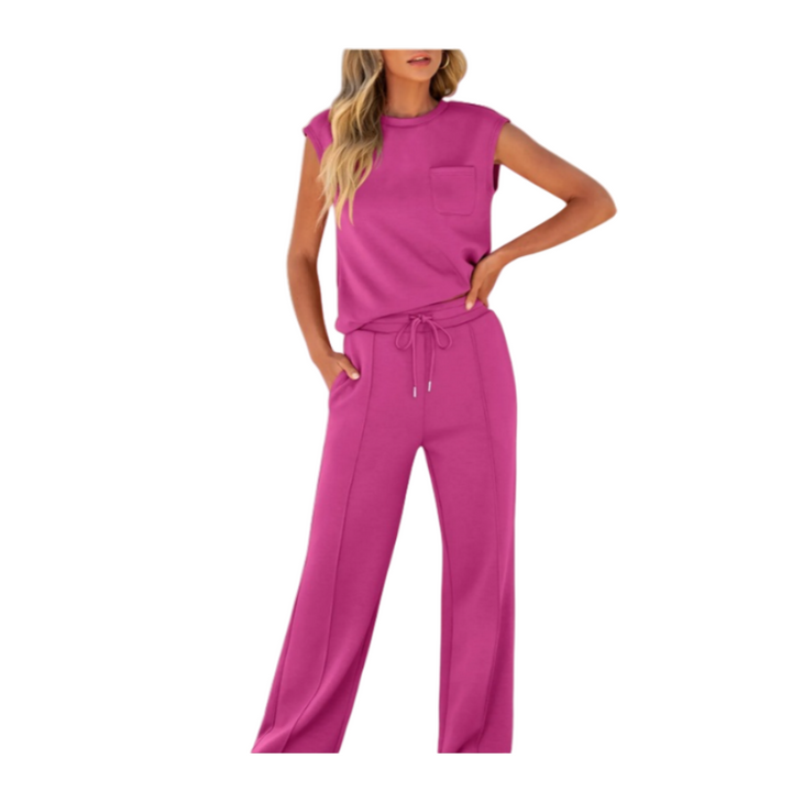Front view worn by model, fuchsia sleeveless top and drawstring pants set with chest and side pockets