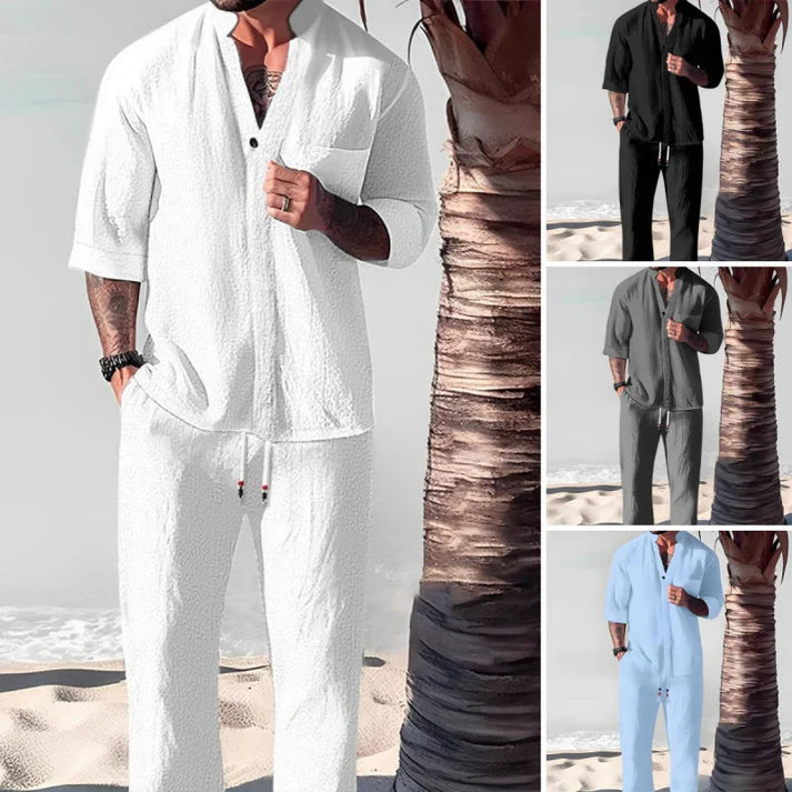 Front view of a model wearing a white cotton-linen V-neck top and trouser set, with black, grey, and blue sets inset