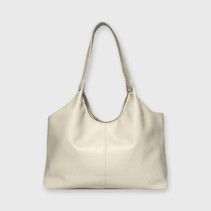 Front view of the Hannah Tote shoulder bag in a light cream leather with a textured finish
