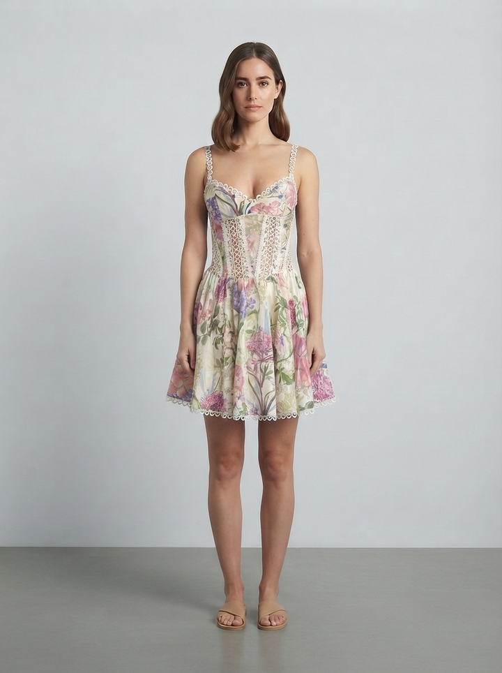Floral corset mini dress with lace trim and a flared skirt, seen from the front