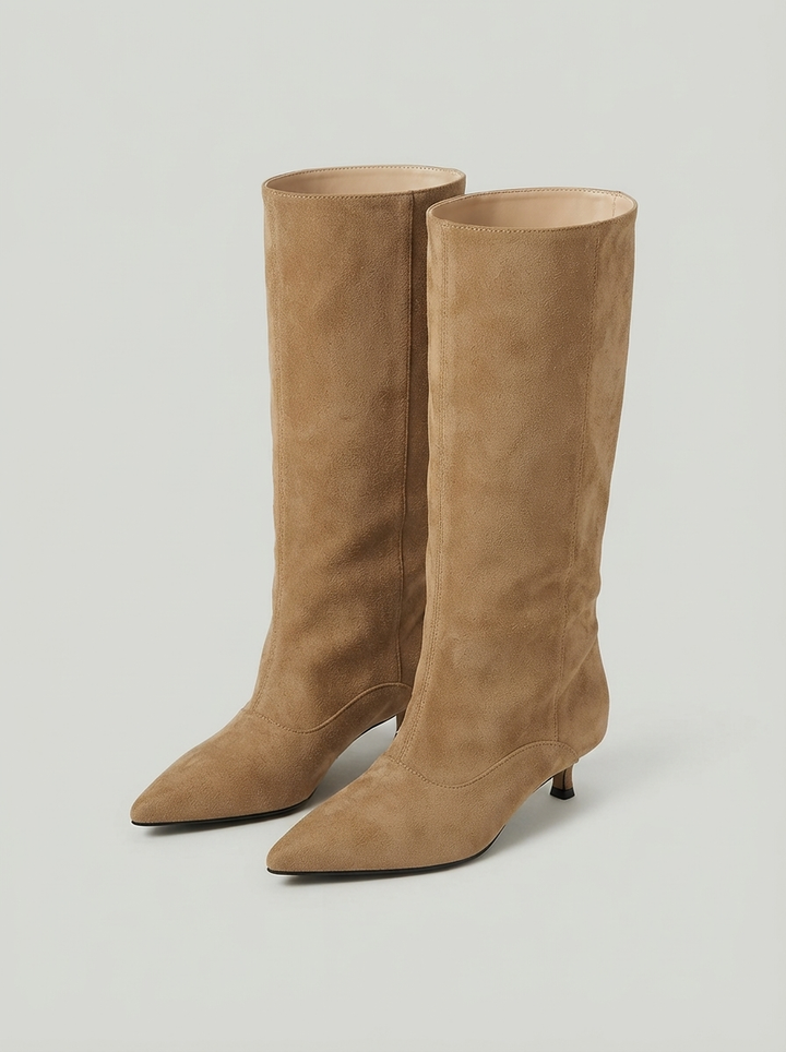 Khaki suede knee high boots with a pointed toe, the pair seen from the front