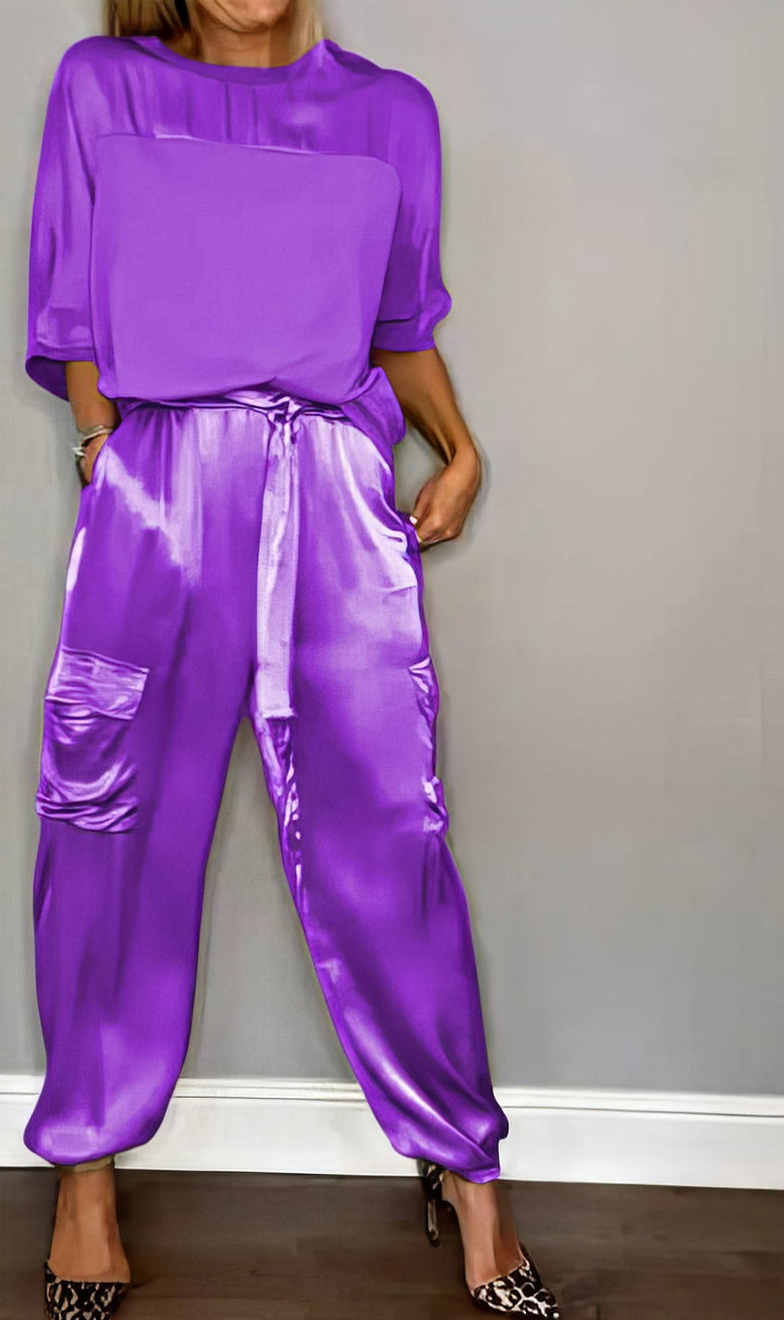 Jade Satin Two-Piece Set, worn by model, showing blouse and cargo trousers with side pockets and tie waist, alternate angle