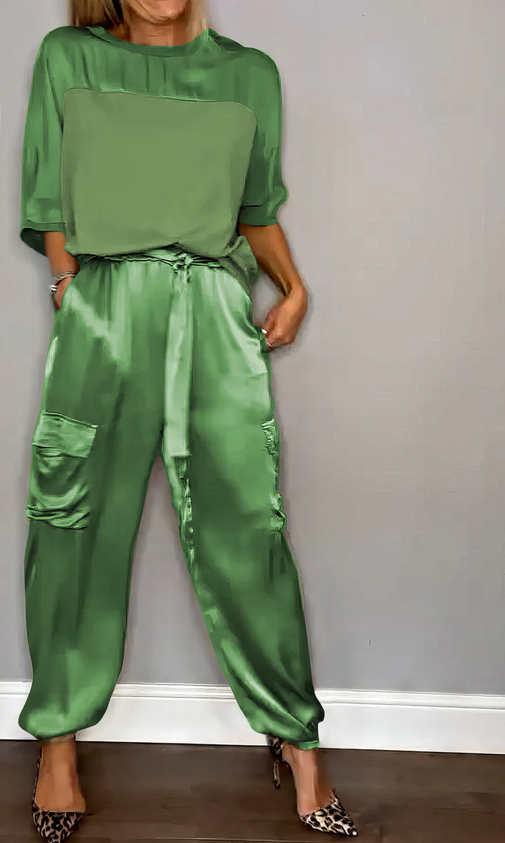 Jade Satin Two-Piece Set, worn by model, showing blouse with two-tone detail and cargo trousers