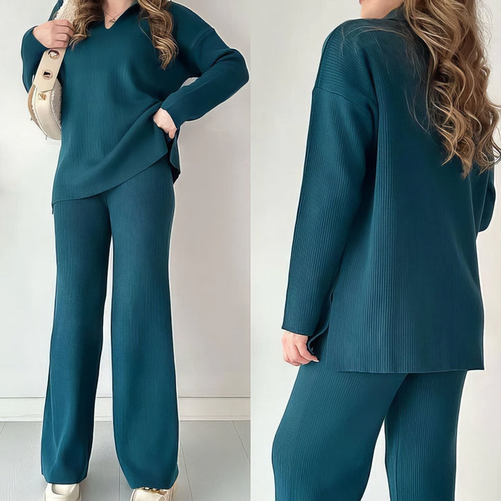 Front and back view of a model wearing a teal ribbed V-neck sweater and wide-leg trousers set