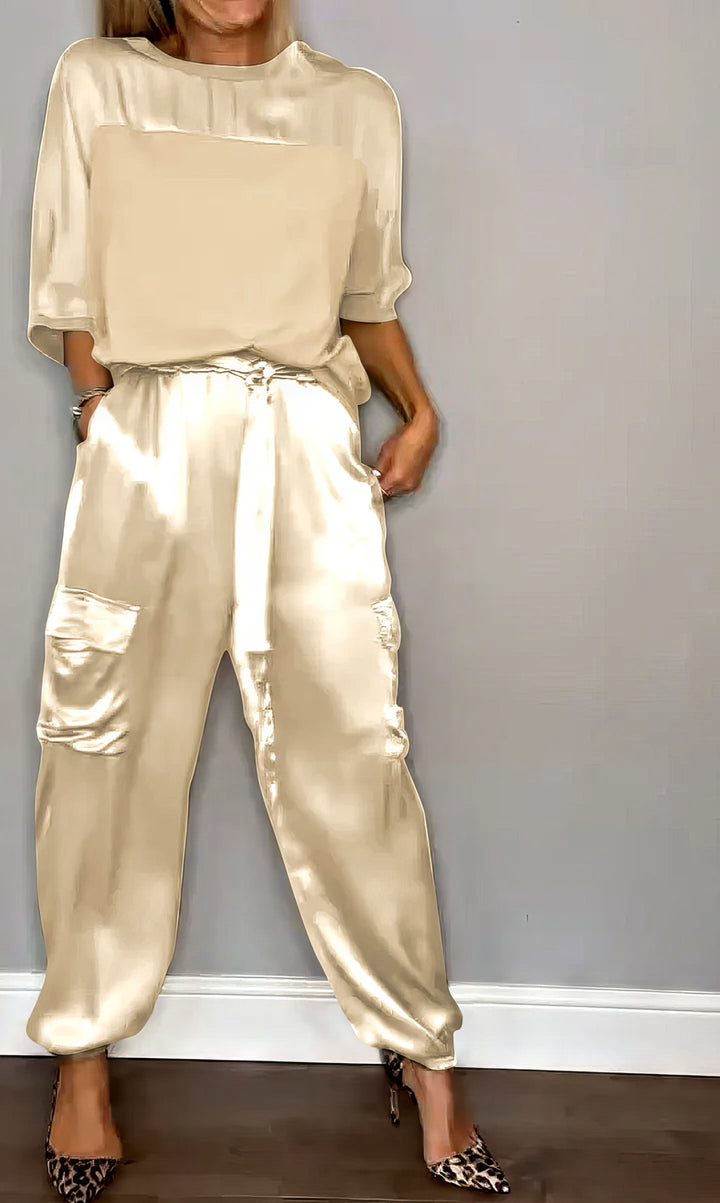Jade Satin Two-Piece Set, worn by model, showing blouse and cargo trousers with tie waist and side pockets