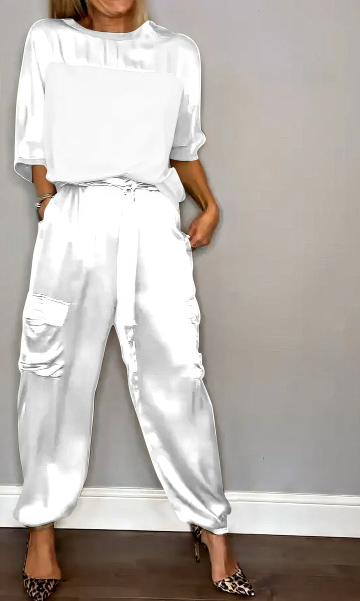 Jade Satin Two-Piece Set, worn by model, showing blouse and cargo trousers with side pockets and tie waist