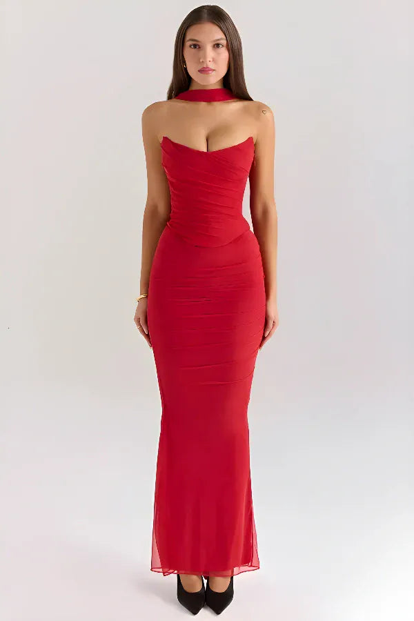 Front view worn by model, a red strapless maxi dress with a sweetheart neckline and ruched bodice
