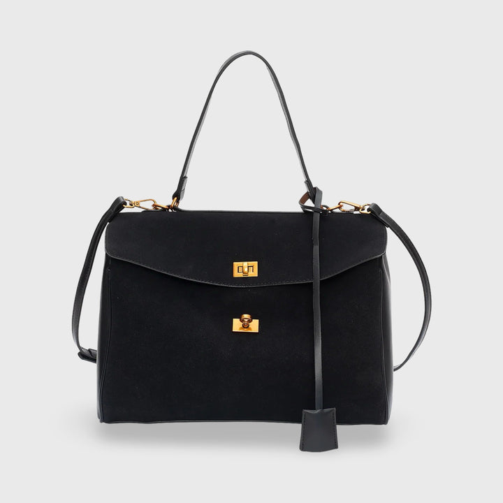 Front view of a black vegan leather and suede women&
