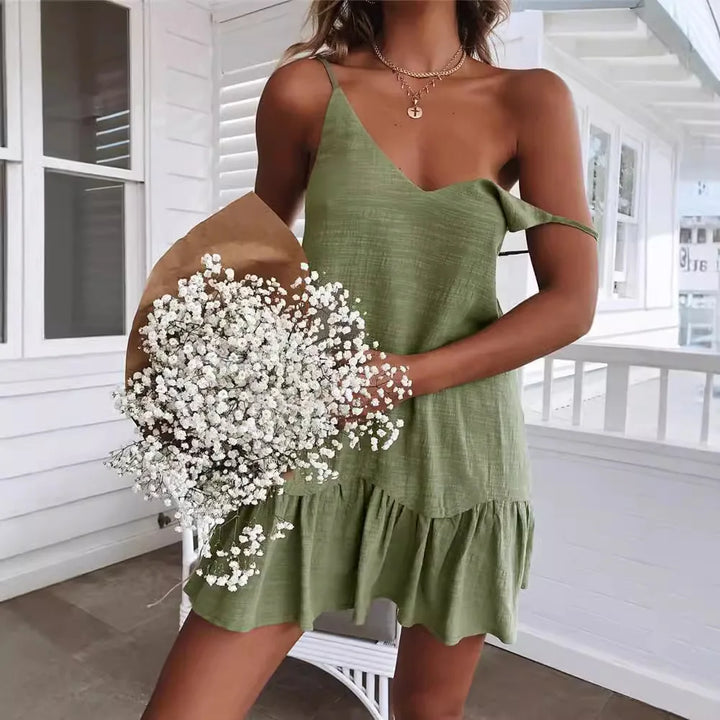 Off-Shoulder Mini Dress worn by model, front view, holding a bouquet of baby&