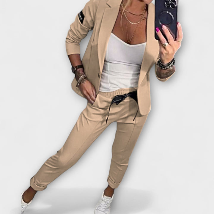 Front view of a model wearing a beige women&