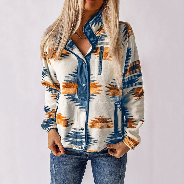 Cream Atsaki fleece jacket with an Aztec pattern and blue trim, front view