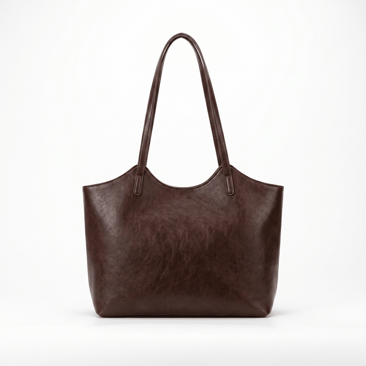 Back view of the Piper vegan leather tote bag in dark brown with a subtle textured finish