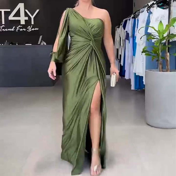 Front view, model wearing a green one-shoulder maxi dress with a thigh-high split and draped detailing